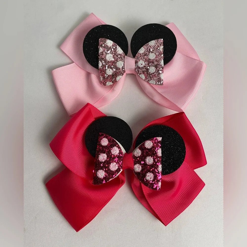2 Mickey Mouse Pink and Red Bow Hair Clips